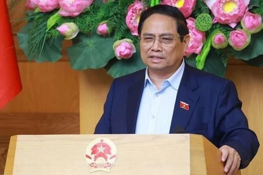 Thủ tướng Phạm Minh Chính chủ trì họp đánh giá tác động của các cuộc xung đột trên thế giới ảnh hưởng đến tình hình kinh tế-xã hội trong nước. (Ảnh: Dương Giang/TTXVN).