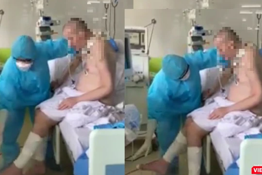 Những hình ảnh mới nhất cho thấy bệnh nhân 91 đã có thể ngồi dậy, đung đưa chân, bắt đầu tập ăn qua đường tiêu hóa (Ảnh cắt từ clip) 