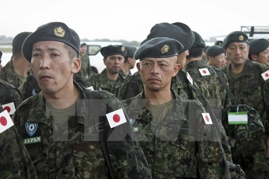Các thành viên thuộc Các Lực lượng Phòng vệ Nhật Bản. (Nguồn: AP/TTXVN)