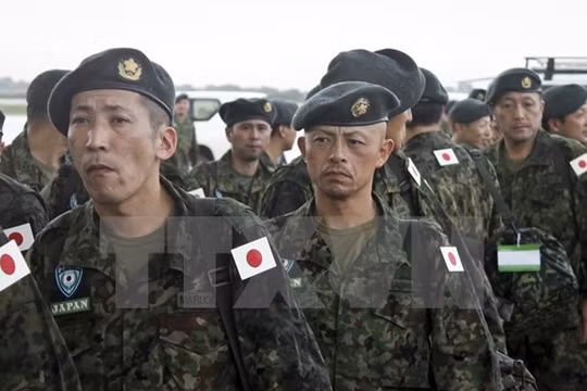 Các thành viên thuộc Các Lực lượng Phòng vệ Nhật Bản. (Nguồn: AP/TTXVN)
