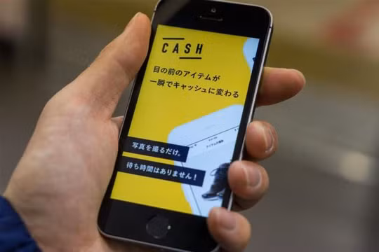Giao diện ứng dụng Cash trên smartphone tại Tokyo. Ảnh Bloomberg.