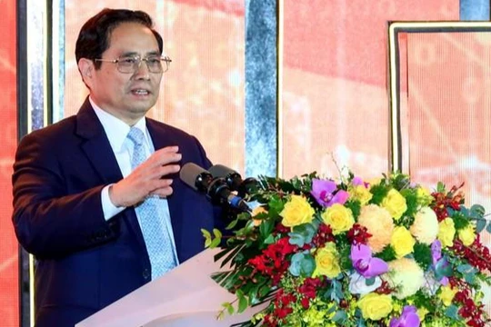 Thủ tướng Phạm Minh Chính - Chủ tịch Ủy ban Quốc gia về Chuyển đổi số - trao đổi tại Diễn đàn Quốc gia phát triển doanh nghiệp công nghệ số năm 2021.