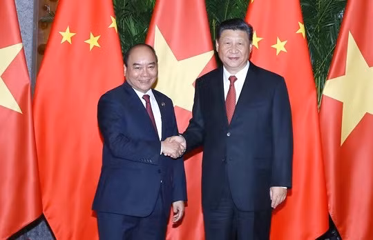 Thủ tướng Nguyễn Xuân Phúc và Tổng Bí thư, Chủ tịch Trung Quốc Tập Cận Bình. Ảnh: VGP