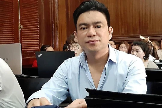 Bác sĩ Chiêm Quốc Thái tại phiên tòa sơ thẩm hôm 26/6