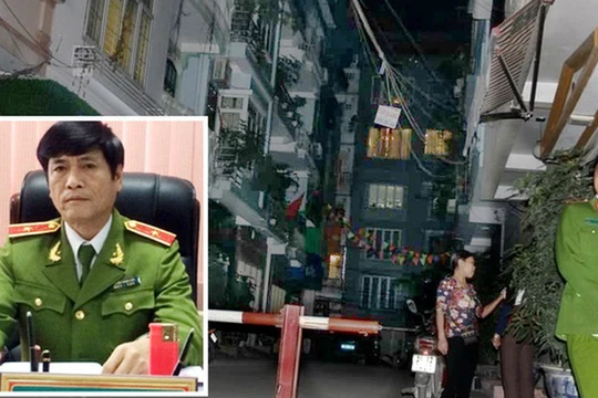 Cơ quan công an tiến hành khám xét nhà ông Hóa tối 11-3. Ảnh nhỏ: ông Nguyễn Thanh Hóa - Ảnh: G.LONG