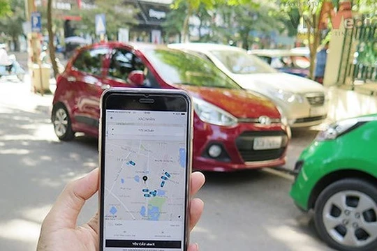 Các hãng taxi truyền thống cho rằng Grab và các hãng taxi công nghệ khác đang cạnh tranh thiếu lành mạnh, phá giá thị trường. Ảnh: Bộ Công thương