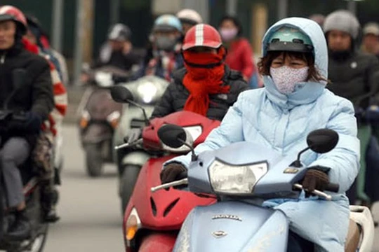 Hà Nội và các tỉnh Bắc, Trung Bộ đang trong đợt rét hại, nhiệt độ phổ biến 8-11 độ C. Ảnh: TTXVN