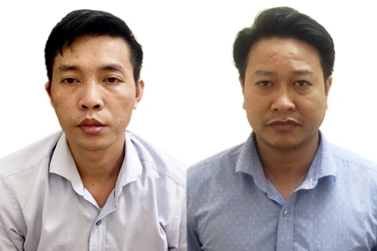 Hai bị can Đỗ Mạnh Tuấn (trái) và Nguyễn Khắc Tuấn. Ảnh: Bộ Công an. 