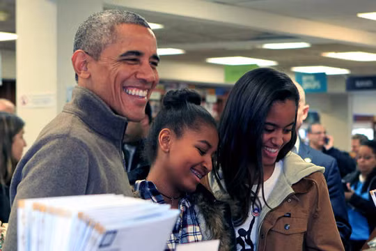 Obama và hai con gái.