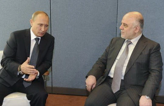 Tổng thống Nga Vladimir Putin trò chuyện với thủ tướng Iraq Haider al-Abadi tại New York trong cuộc họp của Đại hội đồng LHQ tháng 9 vừa qua - Ảnh: Reuters