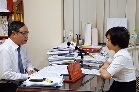 Thẩm phán Trương Việt Toàn trả lời phỏng vấn phóng viên TTXVN. (Ảnh: Nguyễn Cúc/Vietnam+)