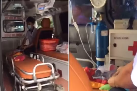 Hình ảnh cháu bé nằm trong xe cứu thương bị chặn tại BV Nhi TW (Ảnh cắt từ clip)