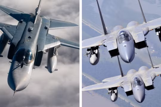 Chiến đấu cơ Su-24M (bên trái) và F-15. Ảnh: MW.