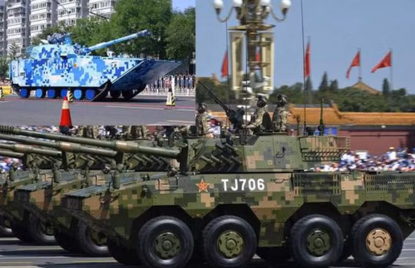 Xe bọc thép bánh lốp ZTL-11 và xe đột kích đôt bộ ZBD05 Trung Quốc trong lễ duyệt binh. Ảnh: Sina