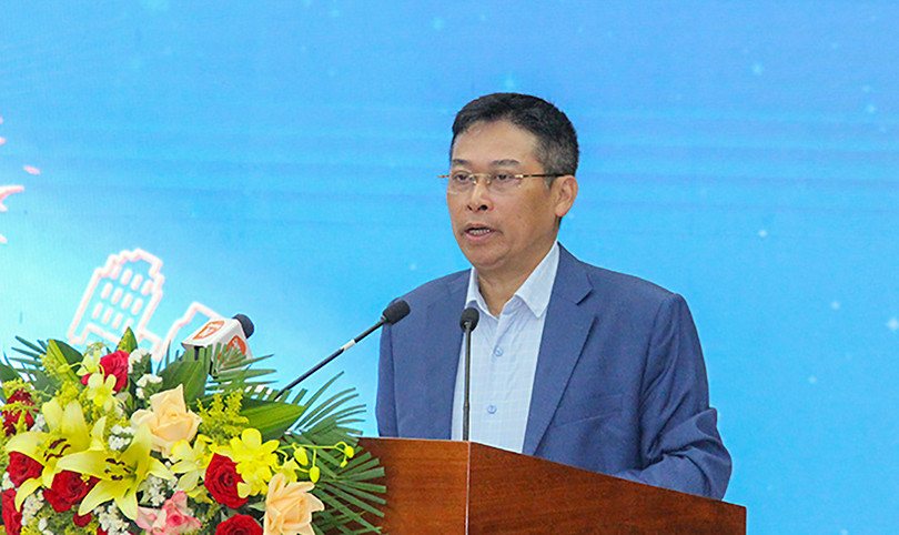 Ông Đào Trung Chính - Cục trưởng Cục Quy hoạch và phát triển tài nguyên đất (Bộ TTN&amp;MT) phát biểu tại hội thảo (Ảnh danang.gov)