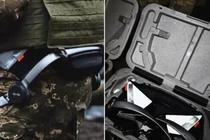 Việc mang vác những quả đạn pháo nặng để nạp đạn thủ công rất tốn sức, vì vậy Ukraine đang tăng cường sức bền và tốc độ của binh lính thông qua thiết bị đeo trên người. Ảnh: IE.