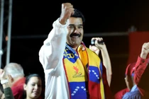 Tổng thống Venezuela Nicolas Maduro phát biểu sau khi kết quả chính thức đầu tiên của cuộc bầu cử được công bố tại Caracas, Venezuela vào ngày 8/12/2013. Ảnh: AFP.