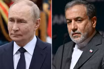 Tổng thống Nga Vladimir Putin và Ngoại trưởng Iran Abbas Araghchi. Ảnh: Getty.