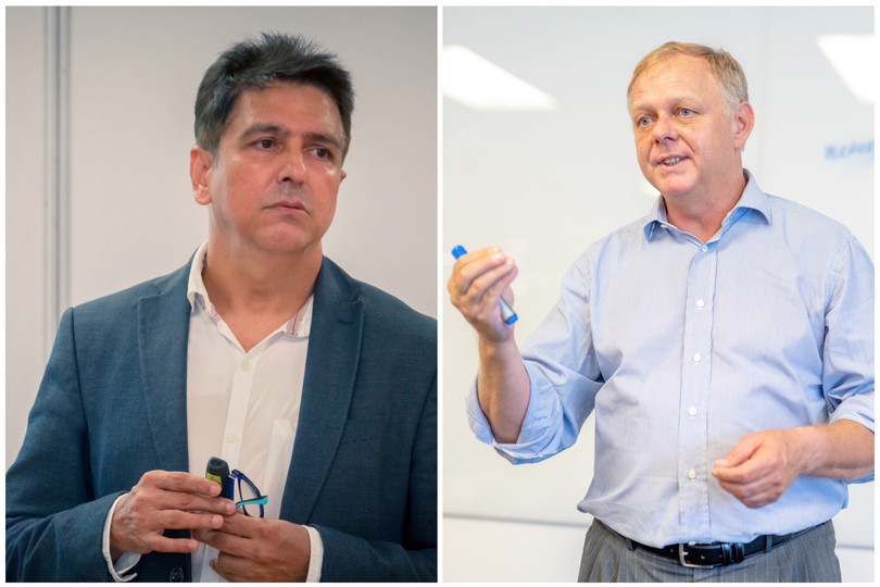 Tiến sĩ Manjit Sandhu (trái) và Tiến sĩ Burkhard Schrage (phải).