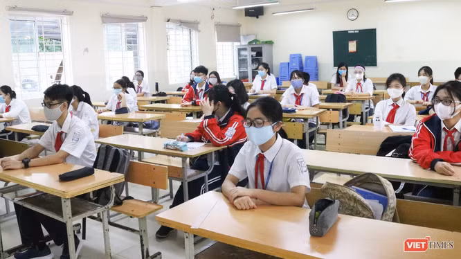 Học sinh đeo khẩu trang phòng COVID-19 trong lớp học (Ảnh - Minh Thuý)
