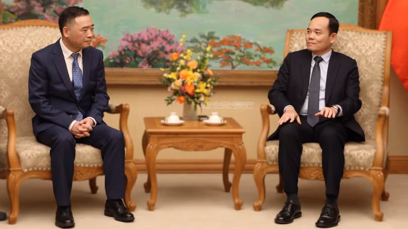 Phó Thủ tướng Trần Lưu Quang và ông Ye Liaoning - Chủ tịch Tập đoàn Sunny (trái) - tại buổi làm việc.