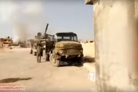 Lực lượng Liwa Fatemiyoun hành quân về Deir Ezzor. Ảnh minh họa Masdar News