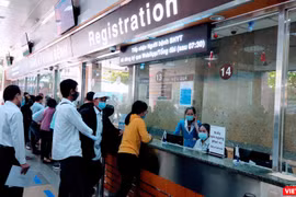 Quầy tiếp nhận bệnh nhân có BHYT tại Bệnh viện ĐH Y Dược TP.HCM (Ảnh: Hoà Bình) 