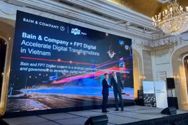 Lãnh đạo FPT Digital và đại diện Bain & Company trong sự kiện tại Tp. HCM. (ảnh: Bain & Company Việt Nam).