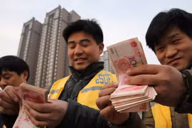 Tiền mặt ngày càng vắng bóng trong các hoạt động thương mại tại Trung Quốc (ảnh: Getty Images)
