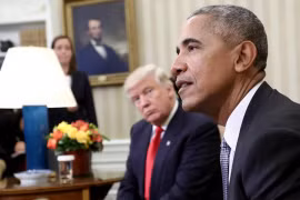 Tổng thống Mỹ Barack Obama và ông Donald Trump.