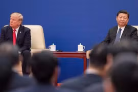Tổng thống Mỹ Donald Trump và Chủ tịch Trung Quốc Tập Cận Bình. Ảnh: DW.