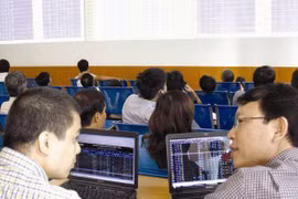 Nhà đầu tư còn có thể bị thiệt khi nhận cổ tức bằng cổ phiếu trong các trường hợp cổ phiếu đang được giao dịch dưới mệnh giá. Ảnh minh họa, Tuệ Doanh.