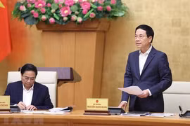Bộ trưởng Bộ TT&TT Nguyễn Mạnh Hùng phát biểu tại Hội nghị toàn quốc về công tác truyền thông chính sách. (Ảnh: TTXVN)