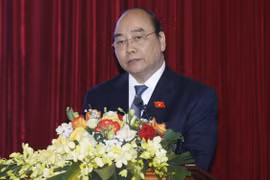 Chủ tịch nước Nguyễn Xuân Phúc, Trưởng Ban Chỉ đạo Cải cách tư pháp Trung ương phát biểu tại hội thảo khoa học.