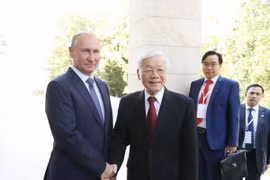 Tổng thống Liên bang Nga Vladimir Putin đón Tổng Bí thư Nguyễn Phú Trọng. Ảnh: TTXVN