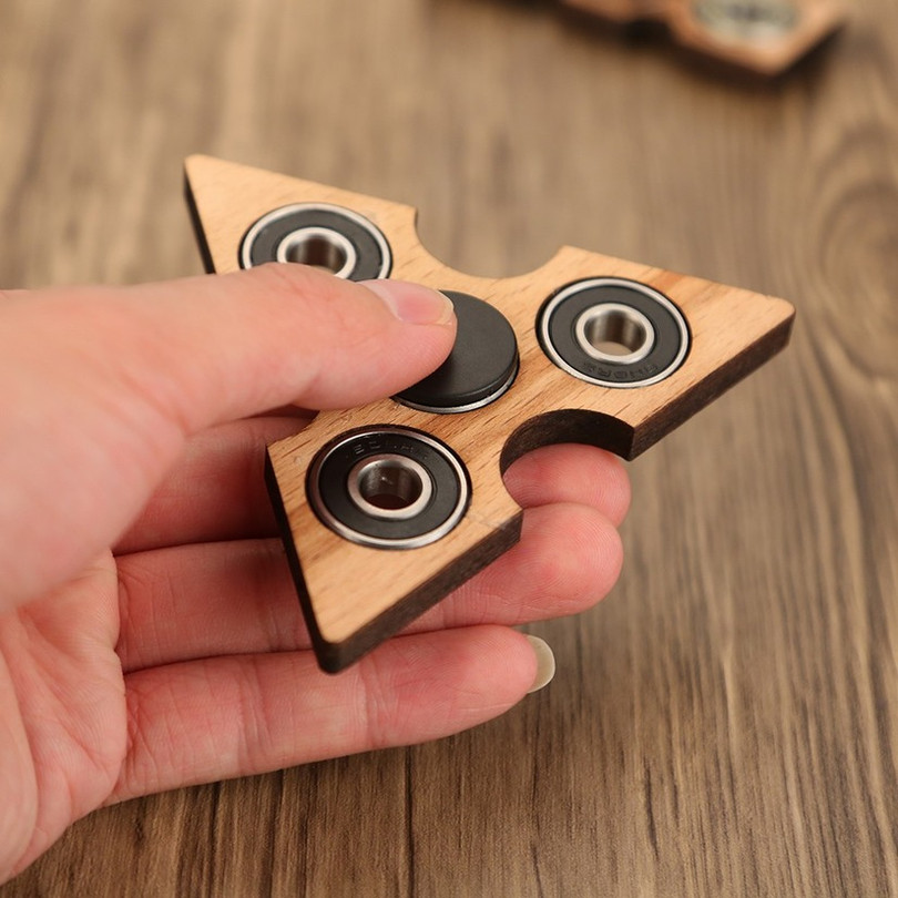 Fidget Spinner là gì? Cách chơi fidget spinner từ dễ đến khó ảnh 2