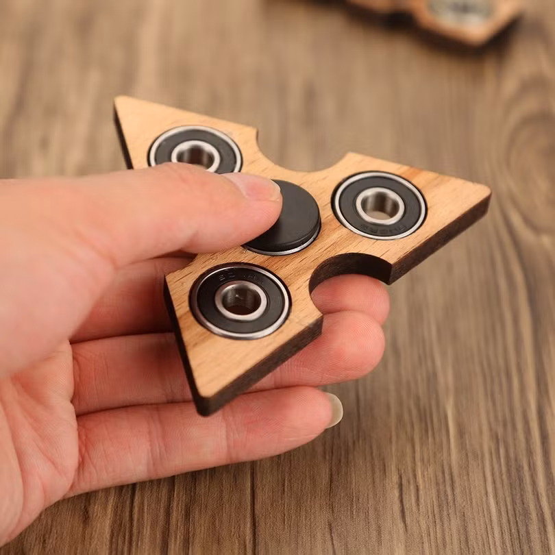 Fidget Spinner là gì? Cách chơi fidget spinner từ dễ đến khó ảnh 2