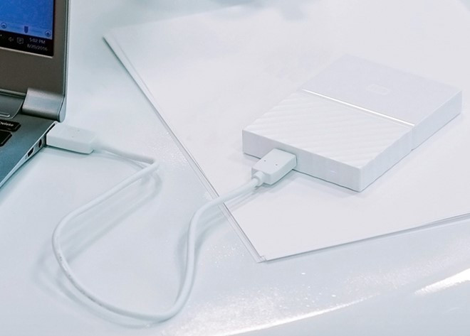 My Passport phiên bản mới được trang bị đầy đủ tính năng cần có của ổ cứng thông minh. 'Cuoc cach mang' ve thiet ke cua o cung di dong My Passport hinh anh 5