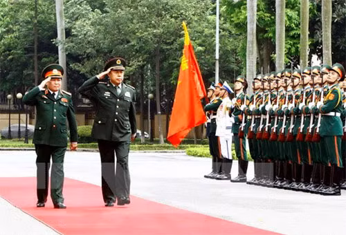 Ông Phạm Trường Long thăm Việt Nam hôm 18/6. Ảnh: TTXVN