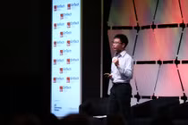 Lê Viết Quốc thuyết trình tại EmTech Singapore. Ảnh: EmTech.