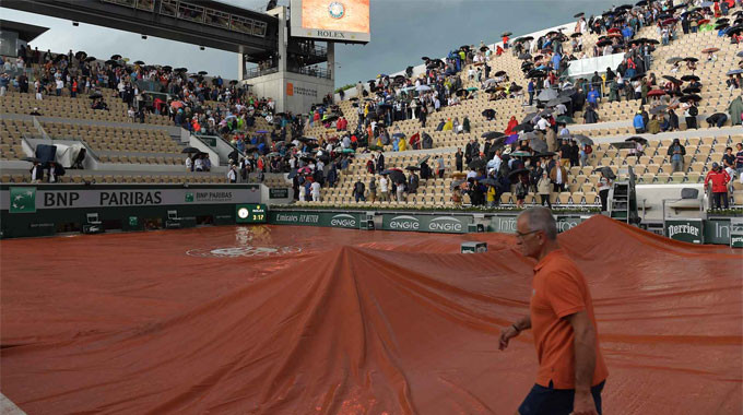 Mưa lớn khiến nhiều trận đấu tại Roland Garros bị hoãn (ảnh ATP) Mưa lớn khiến nhiều trận đấu tại Roland Garros bị hoãn (ảnh ATP)