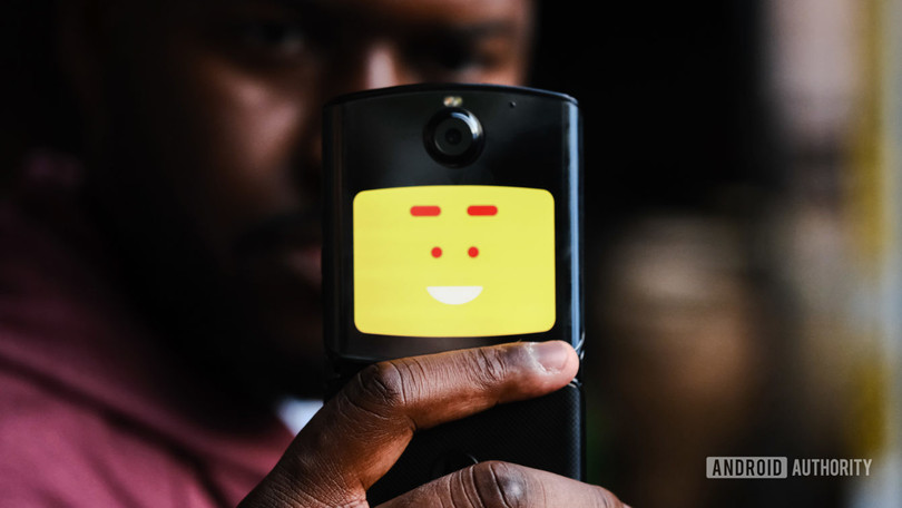 Icon mặt cười "cute" sẽ hiện ta khi bạn chụp ảnh bằng camera sau (Ảnh: Andorid Authority) Icon mặt cười "cute" sẽ hiện ta khi bạn chụp ảnh bằng camera sau (Ảnh: Andorid Authority)