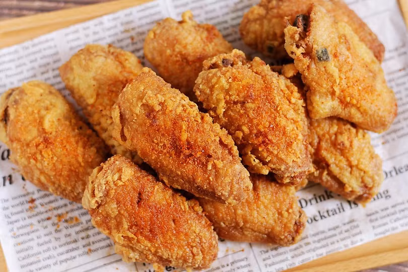 Ăn nhiều đồ chiên rán khiến cơ thể tăng nguy cơ bị ung thư (Ảnh: Baidu).