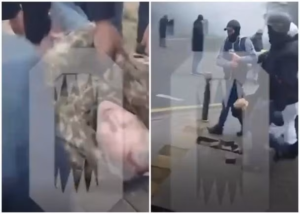 Hình ảnh người biểu tình bị bắn chết ở Quảng trường Cộng hòa, Almaty được khiêng đi (Ảnh: Đông Phương). Hình ảnh người biểu tình bị bắn chết ở Quảng trường Cộng hòa, Almaty được khiêng đi (Ảnh: Đông Phương).