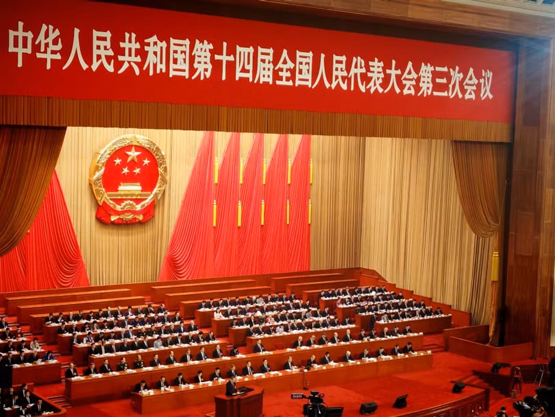 Đoàn chủ tịch Kỳ họp thứ 3 Quốc hội Trung Quốc khóa 14 khai mạc sáng 5/3 tại Đại lễ đường Nhân dân. Ảnh: Dongfang.