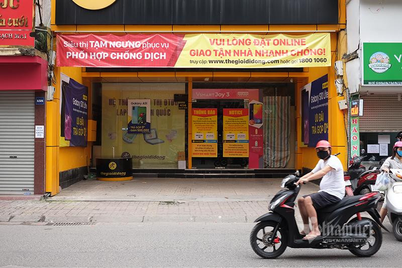 Viện dẫn lý do phải đóng cửa do điều kiện bất khả kháng, Thế giới di động đã ra văn bản thông báo việc không thanh toán hoặc chỉ thanh toán 30% tiền thuê mặt bằng với các đối tác của mình. Ảnh: Trọng Đạt