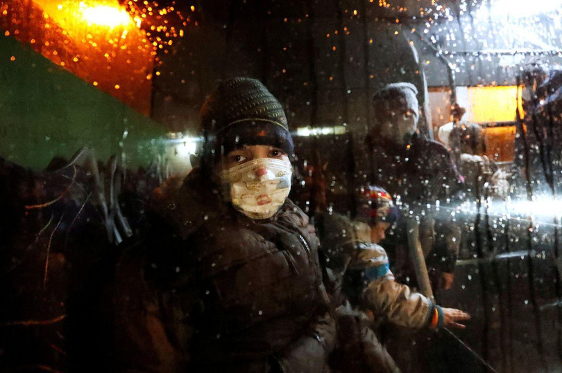 Người dân miền đông Ukraine sơ tán sang Nga (Ảnh: WSJ). Người dân miền đông Ukraine sơ tán sang Nga (Ảnh: WSJ).