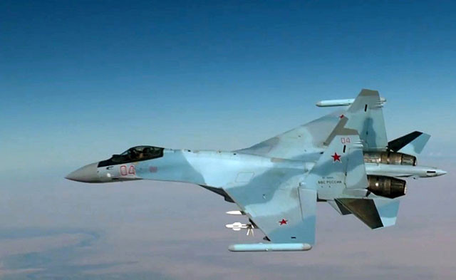 Tiêm kích Su-35S xuất kích chiến đấu ở Syria (Bộ Quốc phòng Nga/Tass)