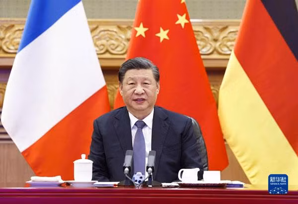 Ông Tập Cận Bình tham dự hội nghị cấp cao trực tuyến cùng Tổng thống Pháp Macron và Thủ tướng Đức Scholz hôm 8/3 (Ảnh: Xinhua). Ông Tập Cận Bình tham dự hội nghị cấp cao trực tuyến cùng Tổng thống Pháp Macron và Thủ tướng Đức Scholz hôm 8/3 (Ảnh: Xinhua).