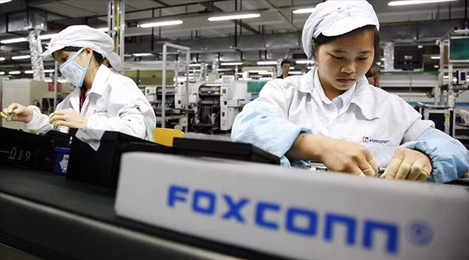 Công nhân Foxconn đang bị giảm giờ làm, hạ lương và cắt phúc lợi ẢNH: AFP